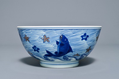 A rare Chinese blue and underglaze red bowl with carps and marine animals, Xuande mark, Kangxi